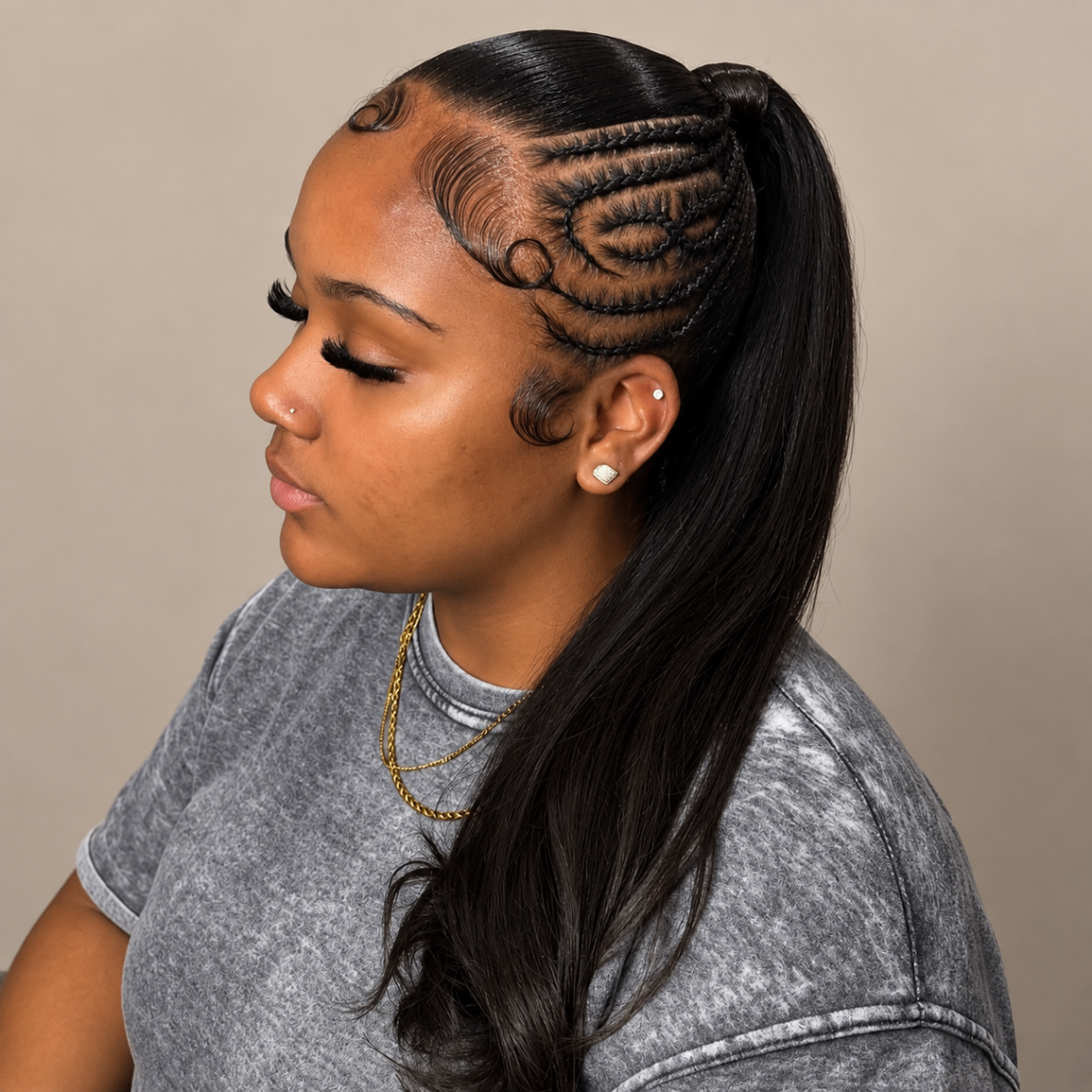 Sleek ponytail with curved accent braids
